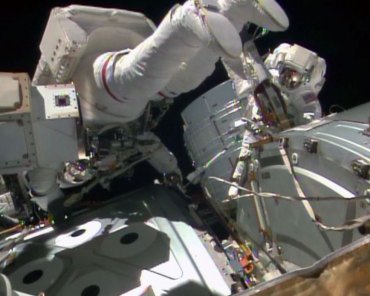 NASA In Brief -- Astronauts repair space station Astronauts made repairs during spacewalk. Image: NASA.